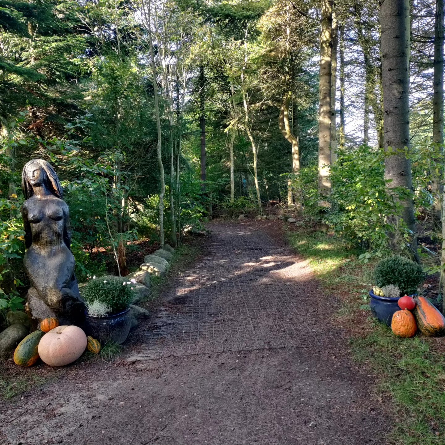 Inner pathway with a sculpture to the side